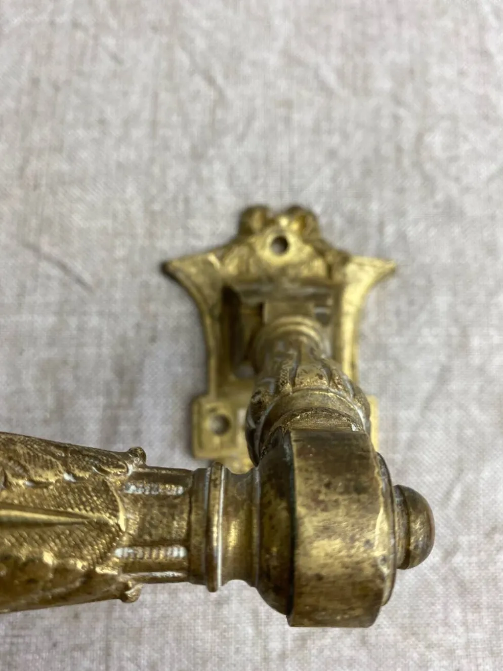 Poignées articulées en bronze
