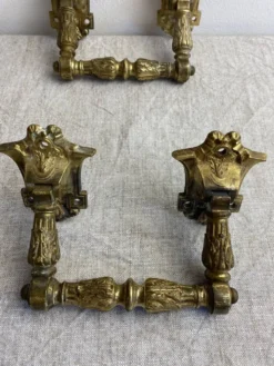 Poignées articulées en bronze