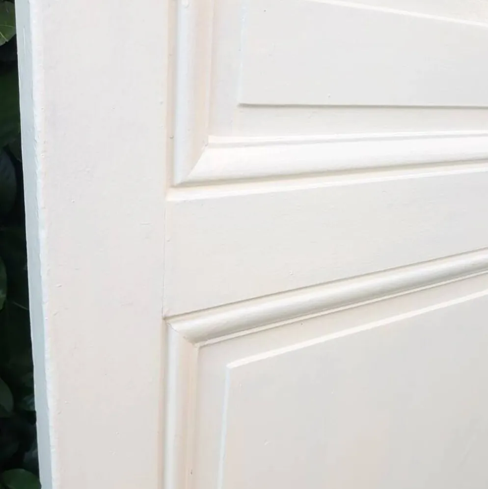 Porte de communication ancienne panneautée et moulurée