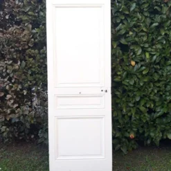 Porte de communication ancienne panneautée et moulurée