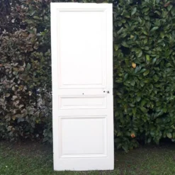 Porte de communication ancienne panneautée et moulurée