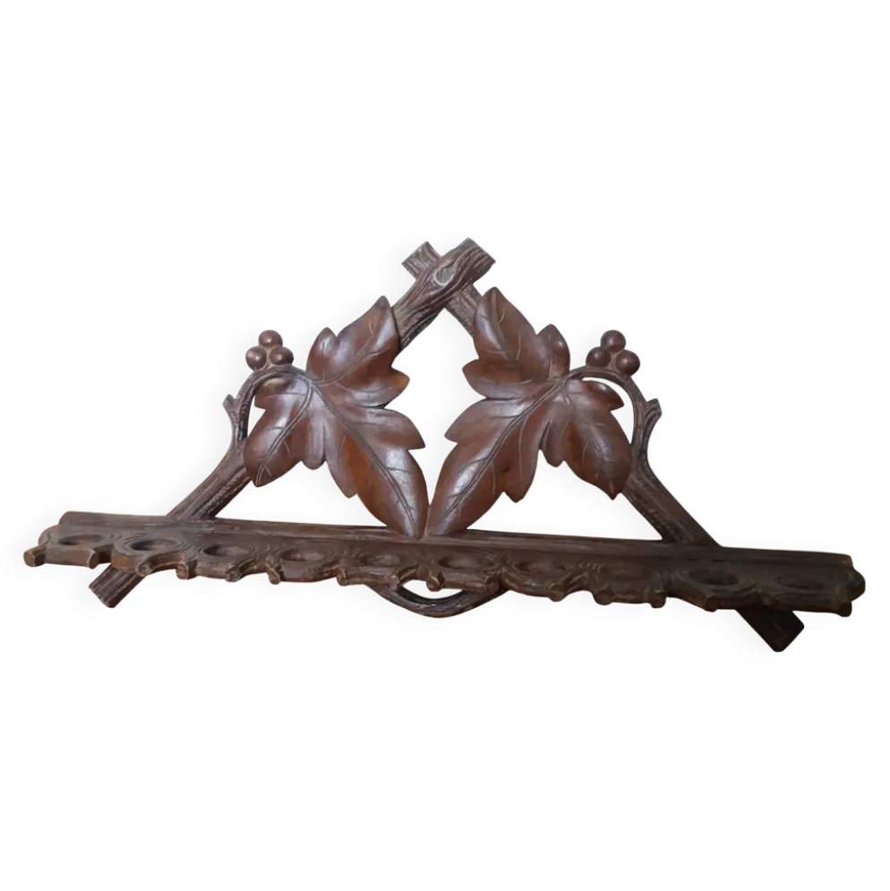 Porte pipes en bois sculpté