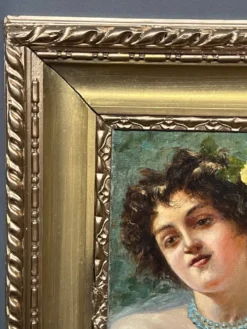 Portrait d'une jeune femme. Signé Nevelli.