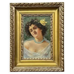 Portrait d'une jeune femme. Signé Nevelli.