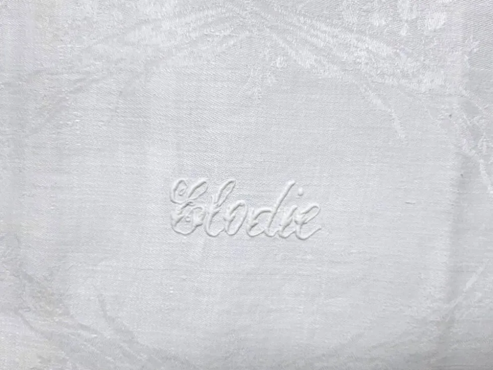 Quatre serviettres de table XIXème brodées "Elodie"