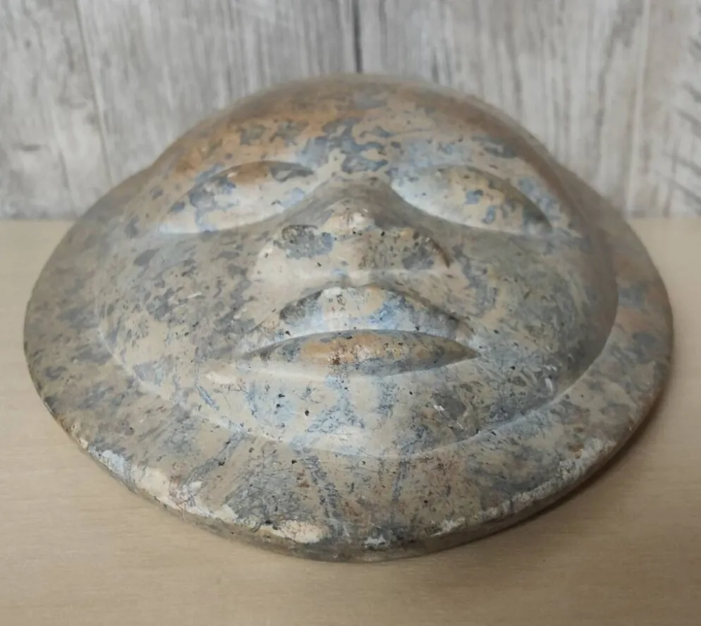 Sculpture visage africain en pierre