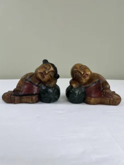 Serre livres en bois sculpté