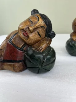 Serre livres en bois sculpté
