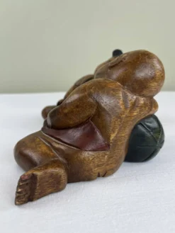 Serre livres en bois sculpté