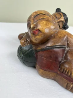 Serre livres en bois sculpté