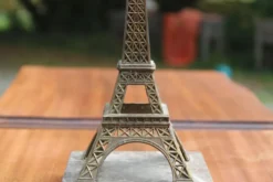Serre-livre Tour Eiffel vintage en métal patiné sur socle en marbre