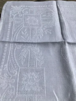 11 serviettes carrées GC damassé fleuri ajouré