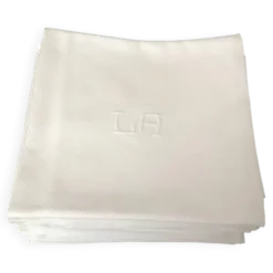 12 serviettes en damassé blanc au monogramme LA