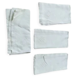 4 serviettes en lin teintées jaune pastel, monogrammées AL