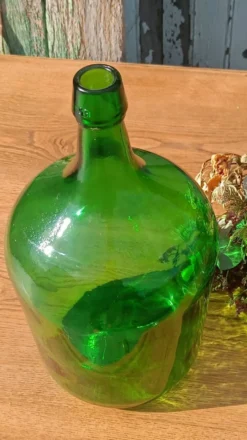 Superbe dame jeanne ancienne en verre vert