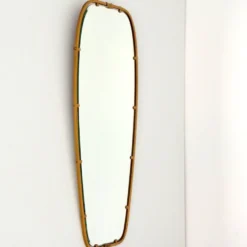 Superbe miroir forme libre en laiton massif année 50 / 60 vintage