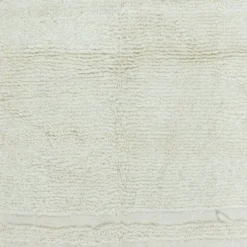 Tapis d'accent turc Tulu vintage minimaliste fait à la main en laine beige naturelle.