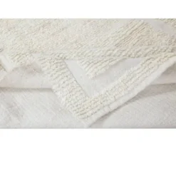 Tapis d'accent turc Tulu vintage minimaliste fait à la main en laine beige naturelle.