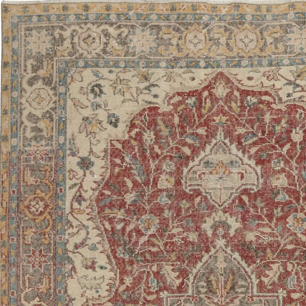 Tapis d'aire turc rouge vintage. Tapis en laine noué à la main avec un design de médaillon.