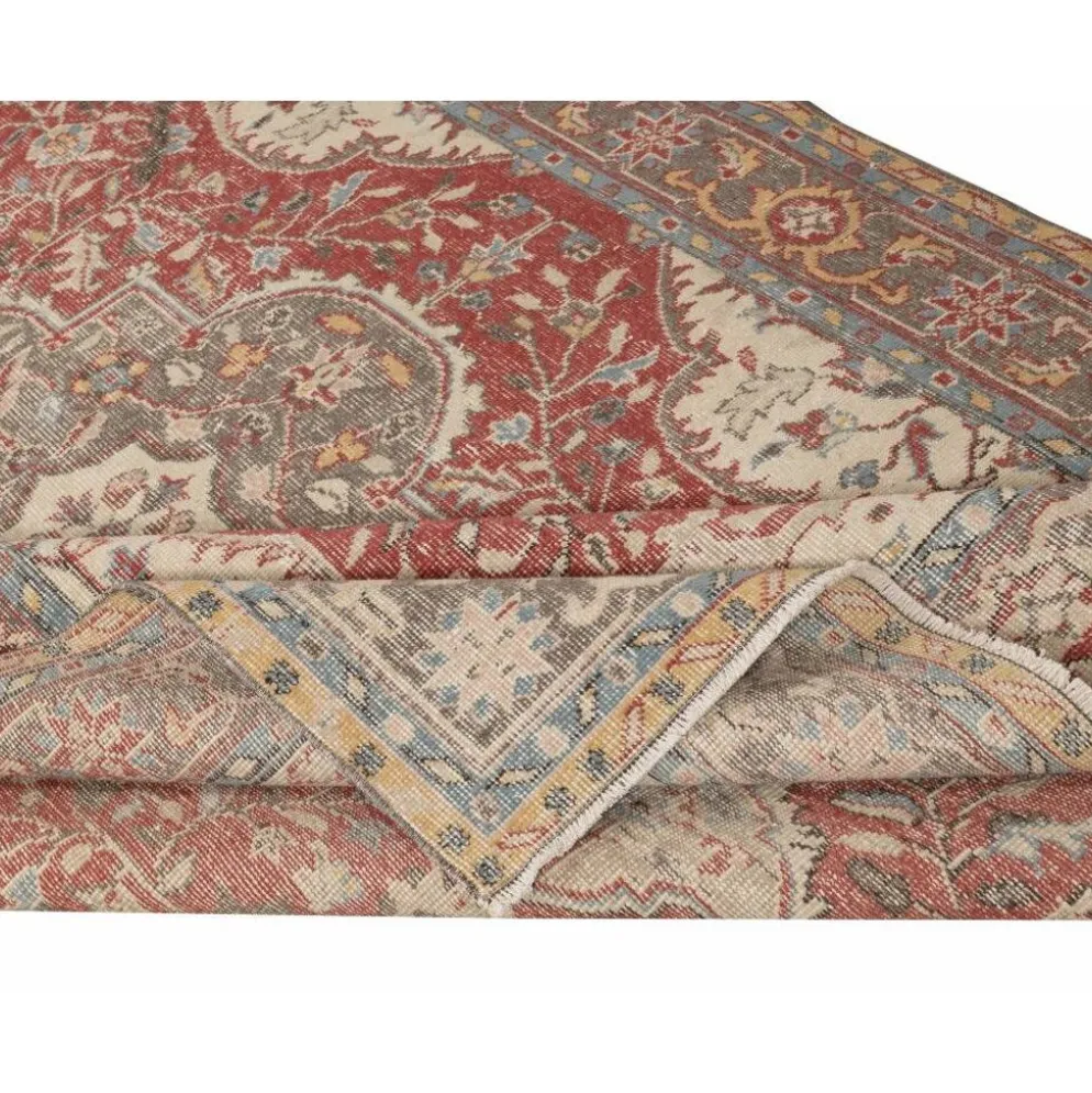 Tapis d'aire turc rouge vintage. Tapis en laine noué à la main avec un design de médaillon.