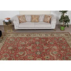 Tapis d'area vintage turc unique en son genre. Tapis en laine rouge noué à la main pour le salon.