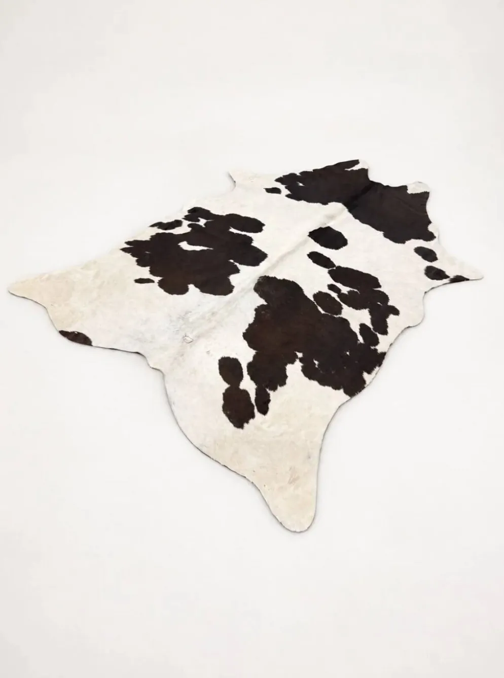 Tapis en peau de vache véritable noir et blanc