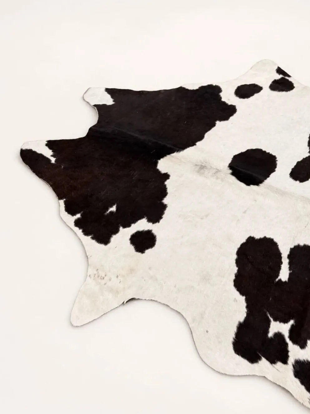 Tapis en peau de vache véritable noir et blanc