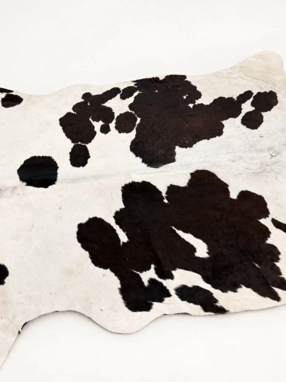 Tapis en peau de vache véritable noir et blanc
