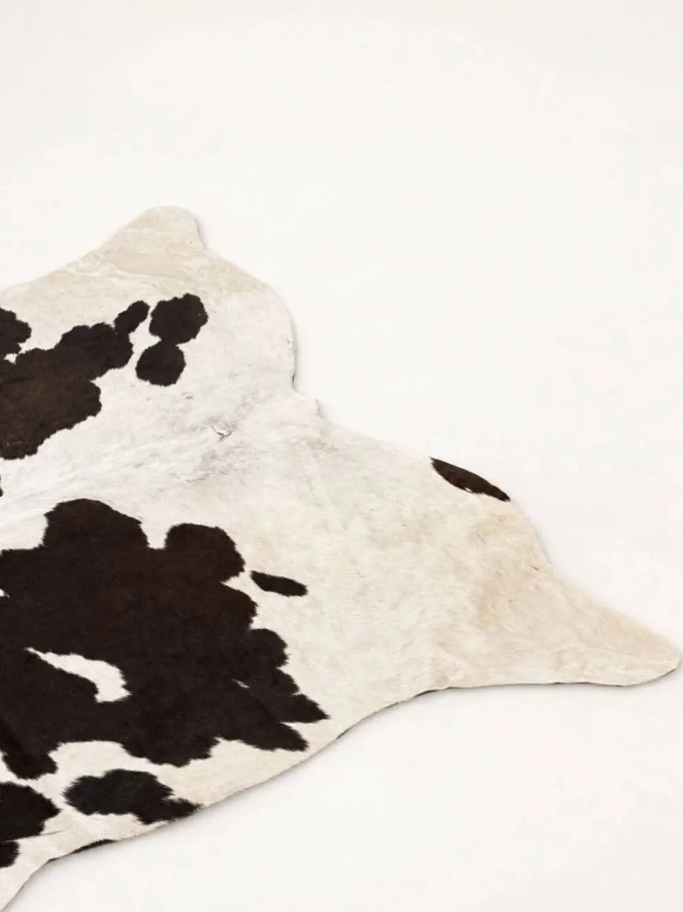 Tapis en peau de vache véritable noir et blanc