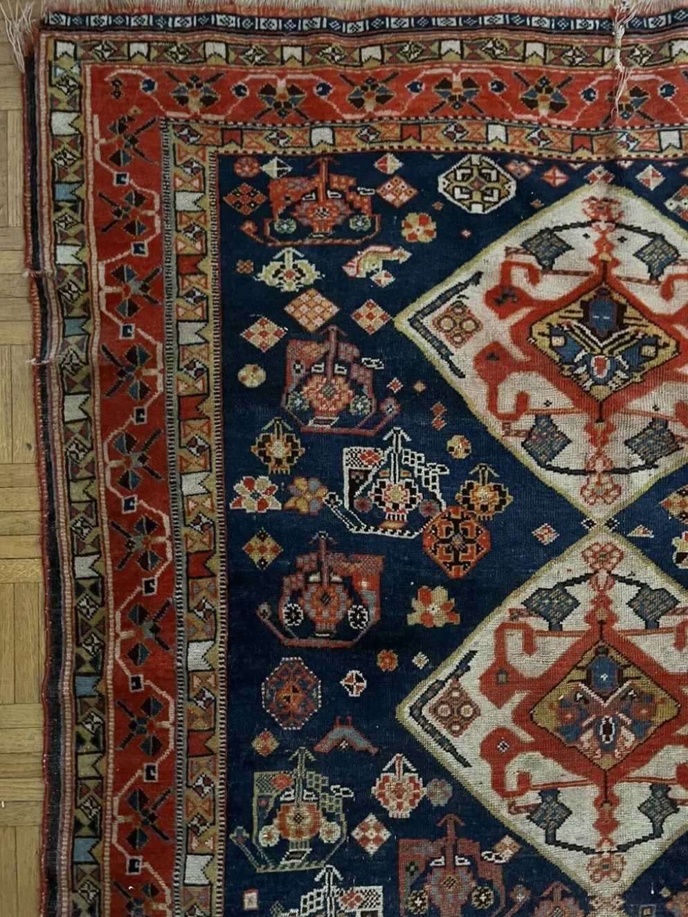 Tapis nomade persan Qashqai ancien fait main – fond bleu 94x112cm