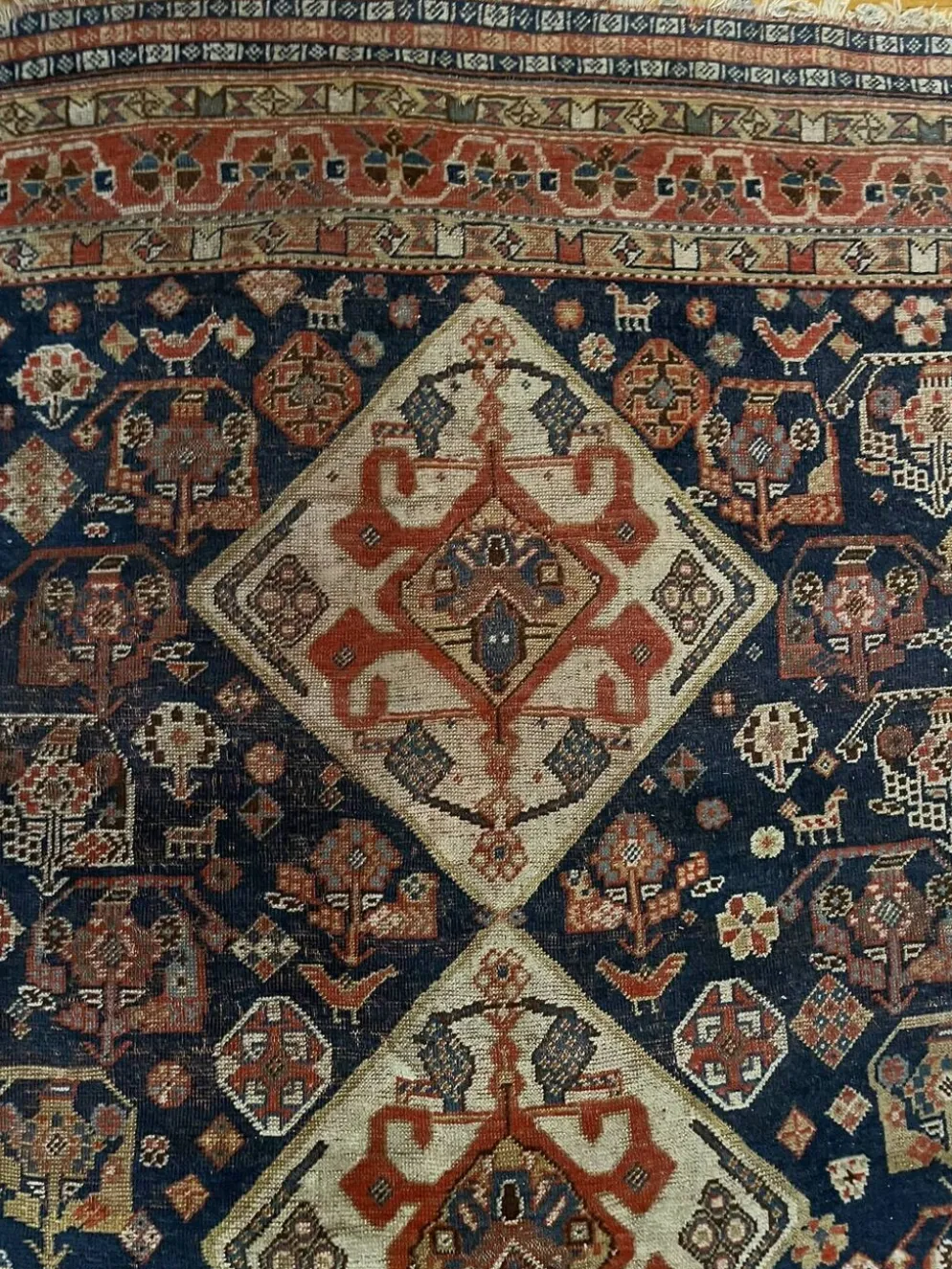Tapis nomade persan Qashqai ancien fait main – fond bleu 94x112cm