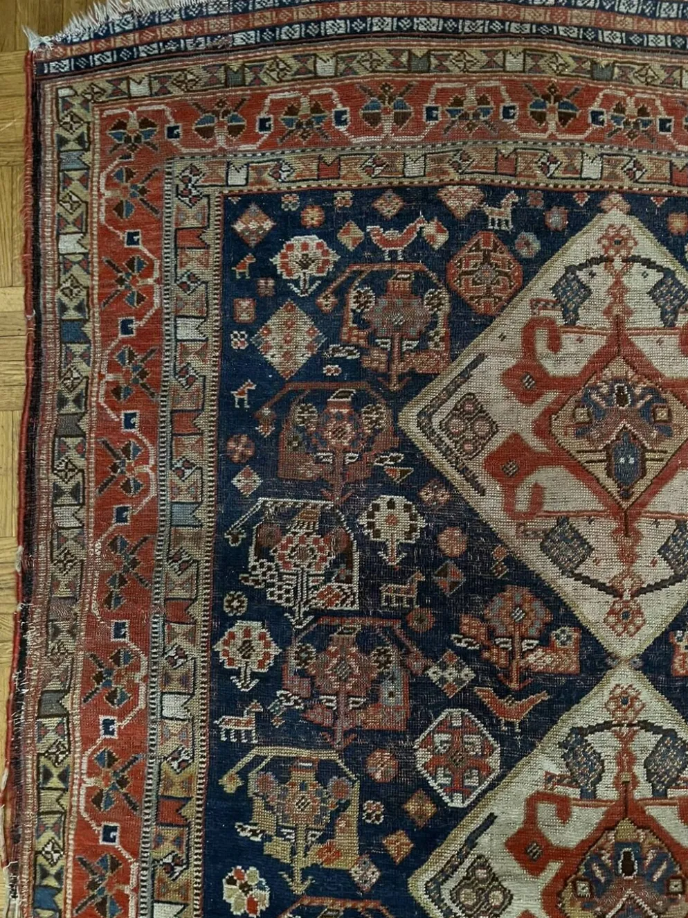 Tapis nomade persan Qashqai ancien fait main – fond bleu 94x112cm