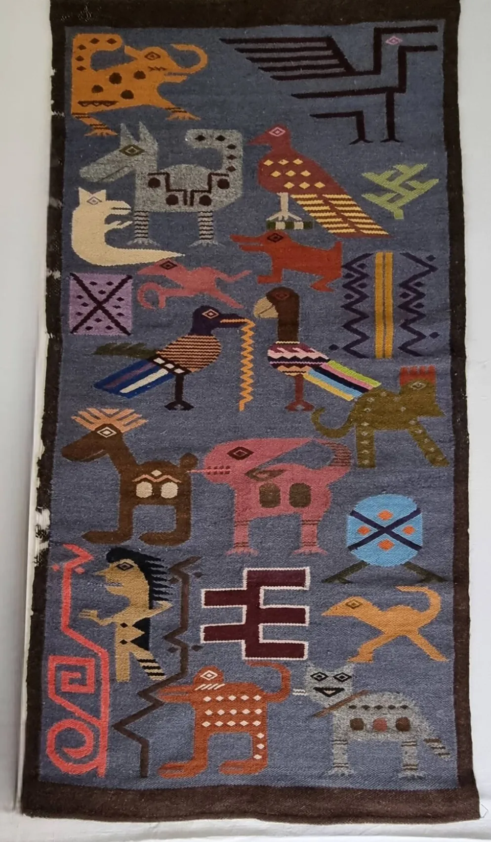Tapisserie murale péruvienne tissée main, motifs zoomorphes, 120 x 60 cm