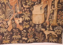 tapisserie représentant la pesée et l'art de forger