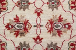 Tapis traditionnel en laine crème, petit tapis oriental à motifs floraux rouges 86 x 123 cm