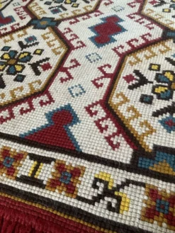 Tapis vintage en laine et frange