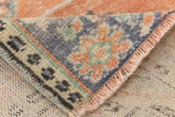 Tapis vintage turc tissé à la main en tons abricot pastel, 177x273 cm