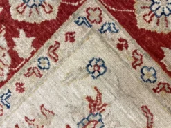 Tapis Ziegler crème à bordure rouge, tapis oriental floral en laine noué à la main