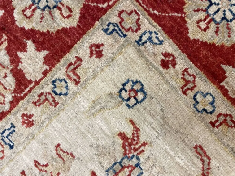 Tapis Ziegler crème à bordure rouge, tapis oriental floral en laine noué à la main