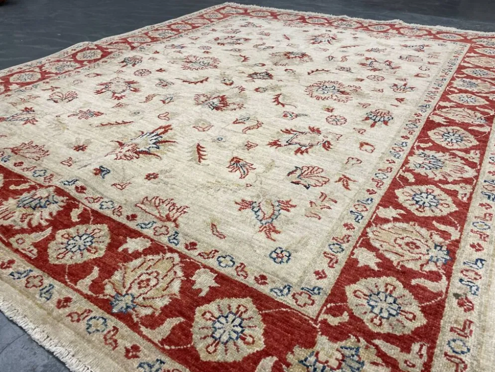 Tapis Ziegler crème à bordure rouge, tapis oriental floral en laine noué à la main