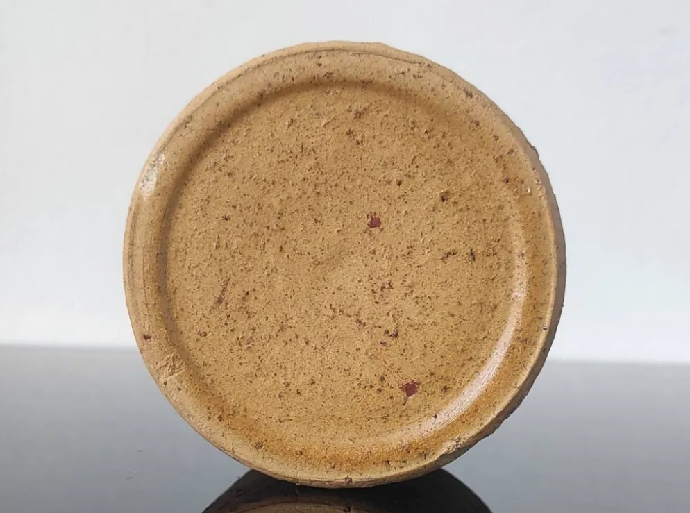 Tasse, pot en grès brut pyrité et émail