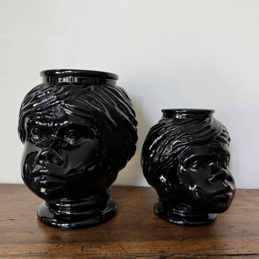 2 têtes en verre représentant des Maures