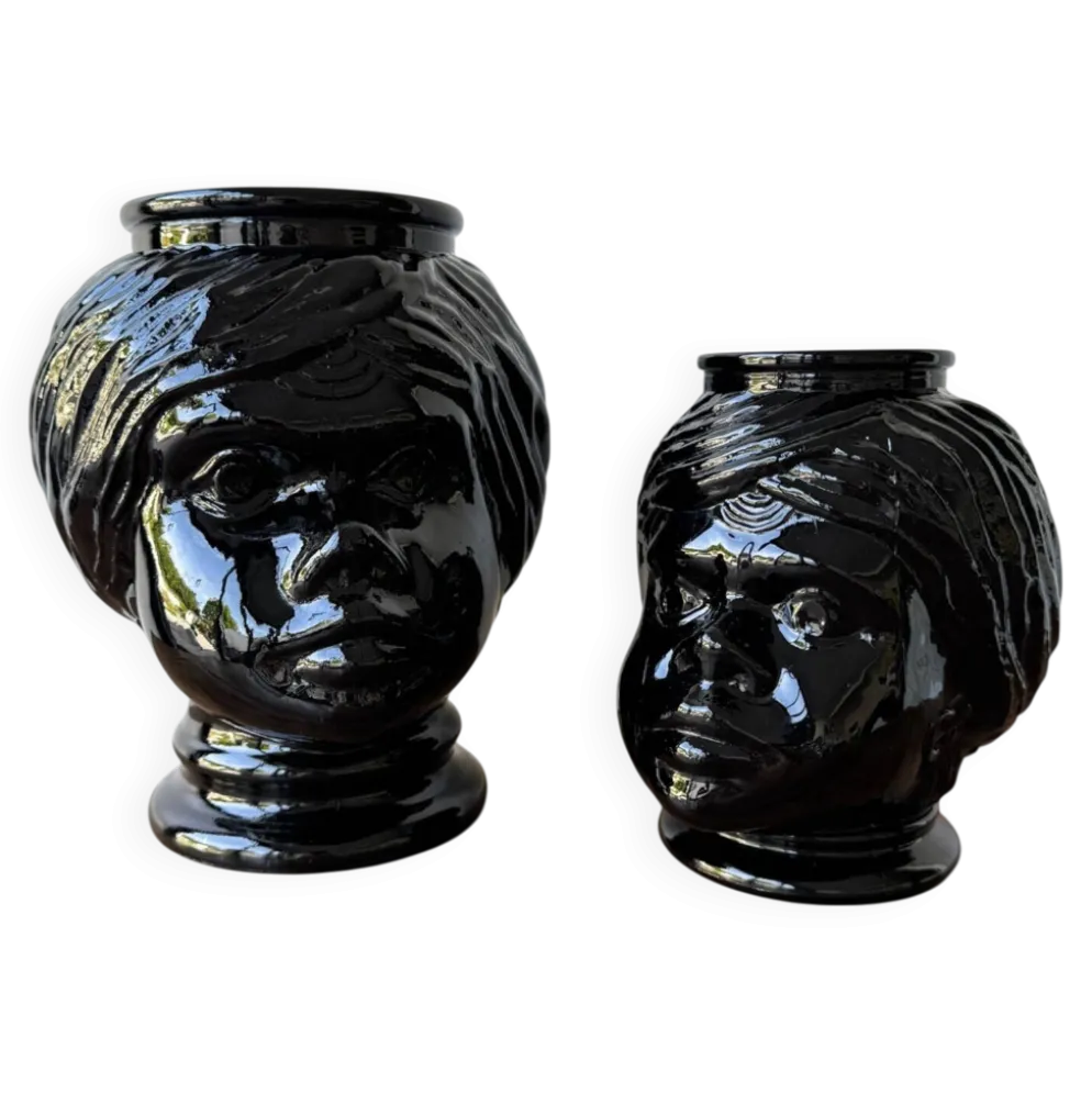 2 têtes en verre représentant des Maures