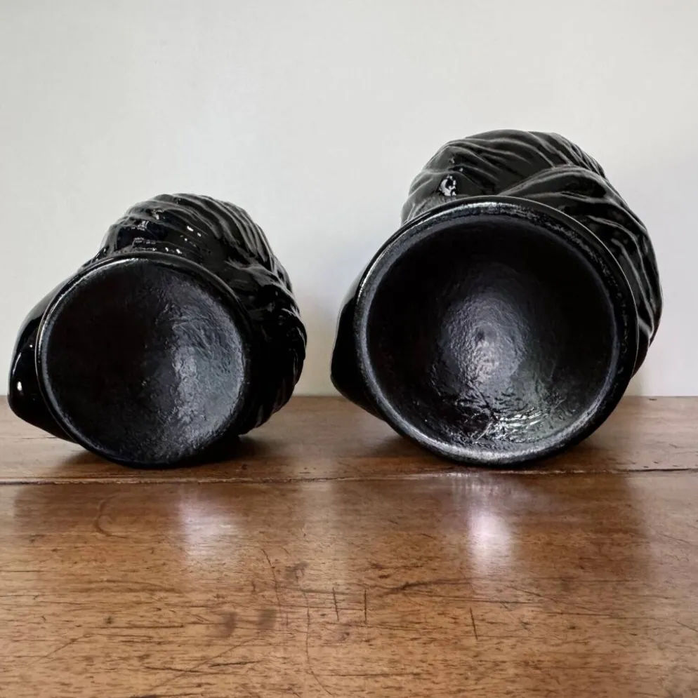 2 têtes en verre représentant des Maures